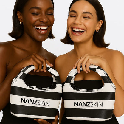 Two women holding black and white striped bags with 'NANZSKIN' branding.